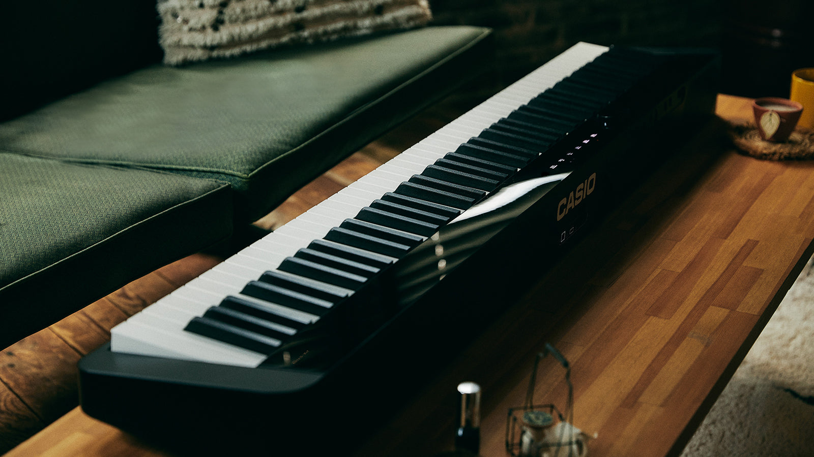 A Casio Privia on a coffee table in a stylish living space