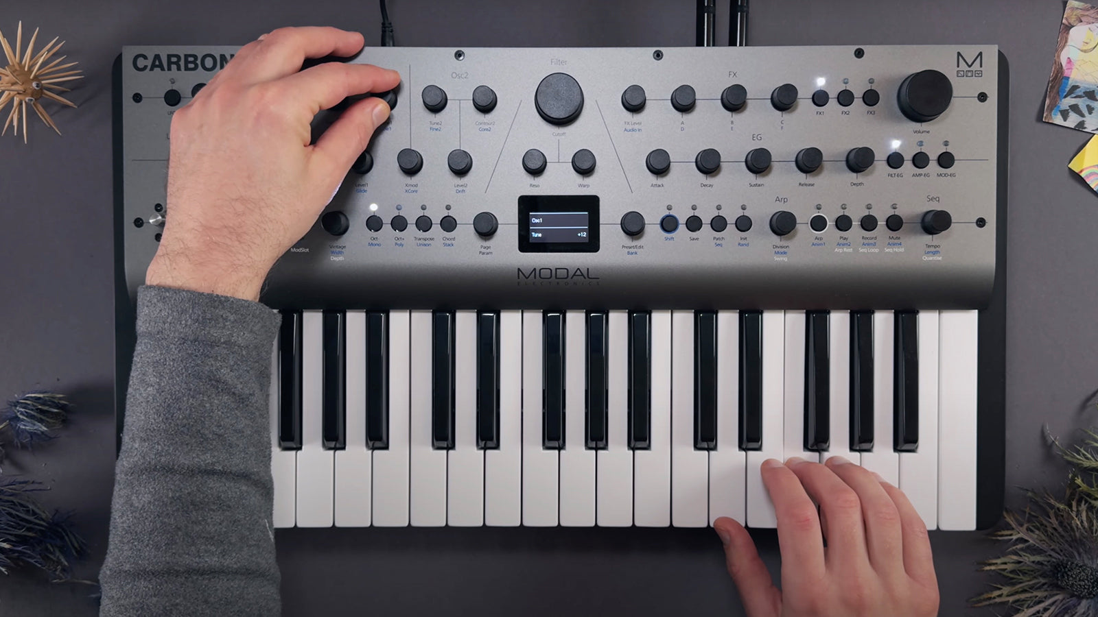 Someone operating a Modal Carbon8