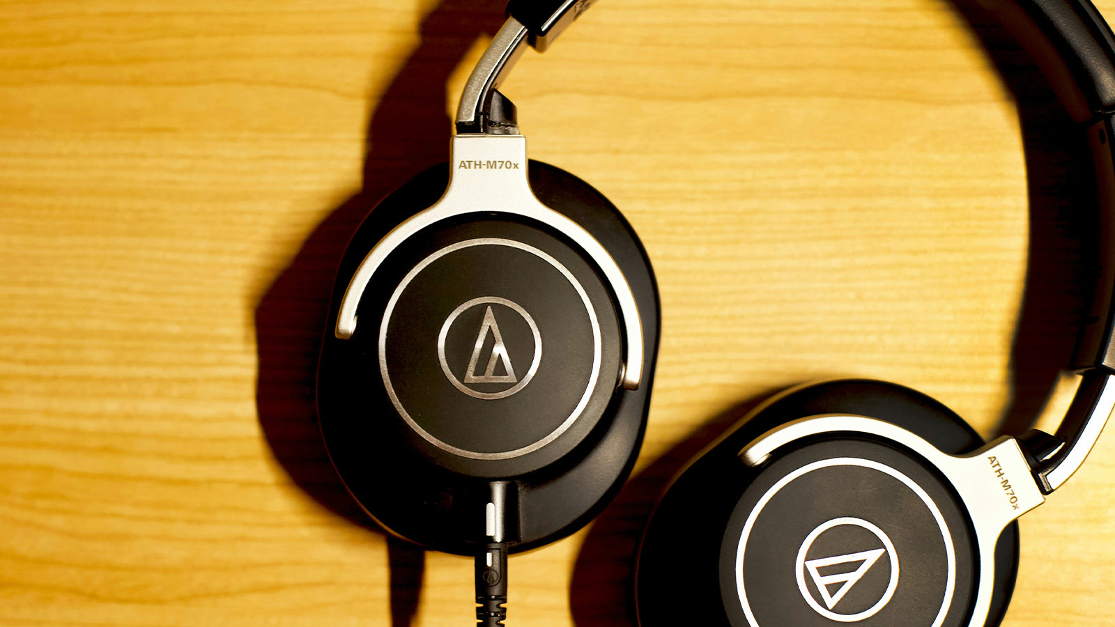 A pair of headphones resting on a table