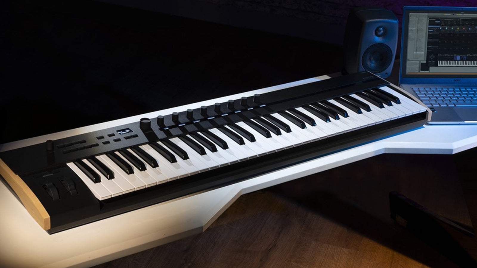 A Korg Keystage on a desk in a recording studio
