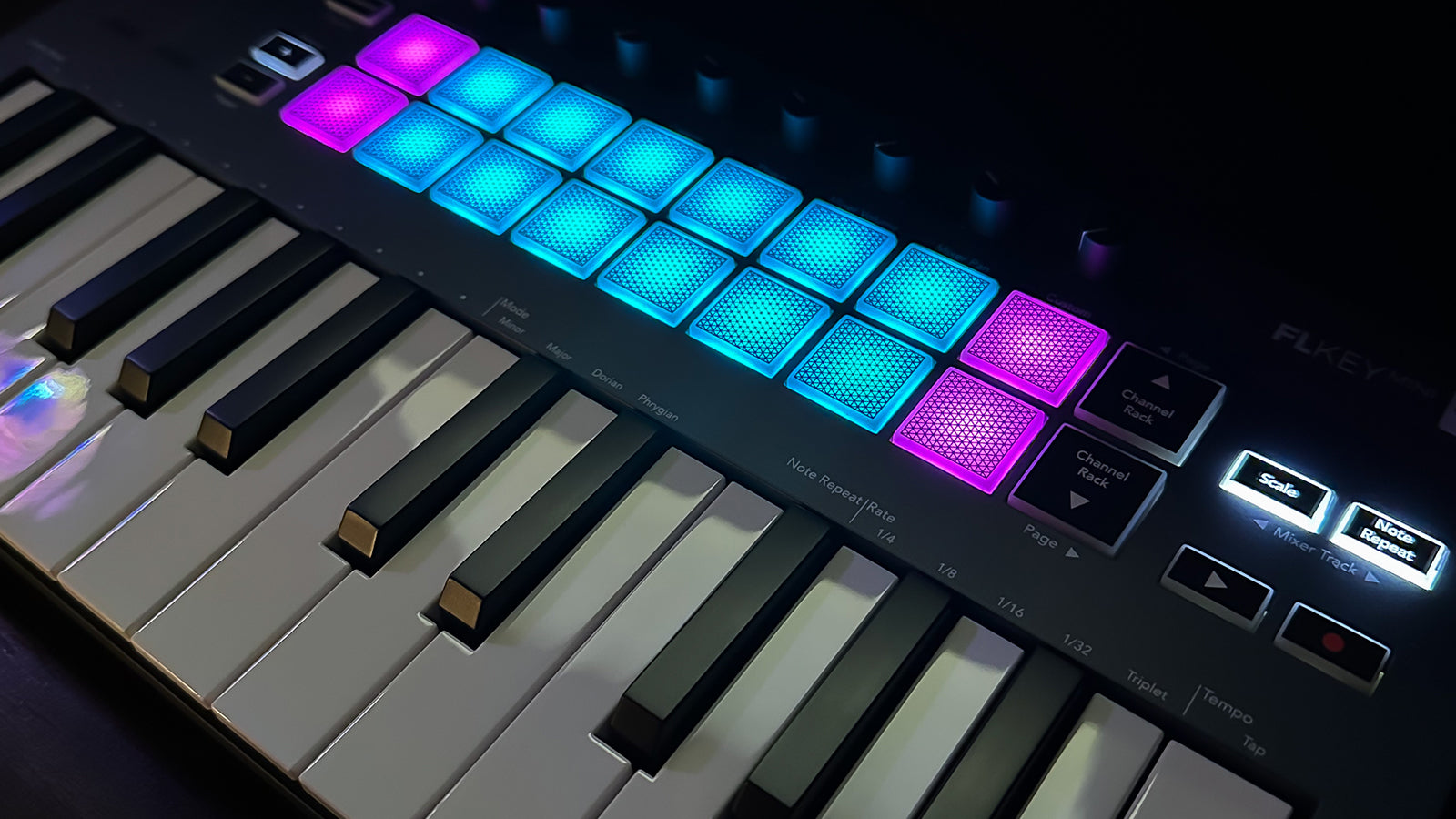 A Novation controller on a desk in a studio