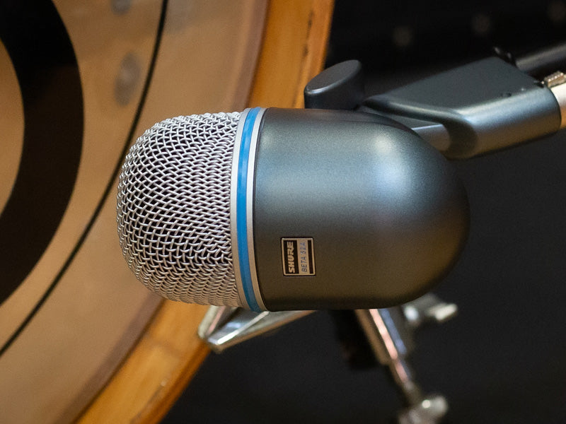 Shure Beta 52 microphone near bass drum