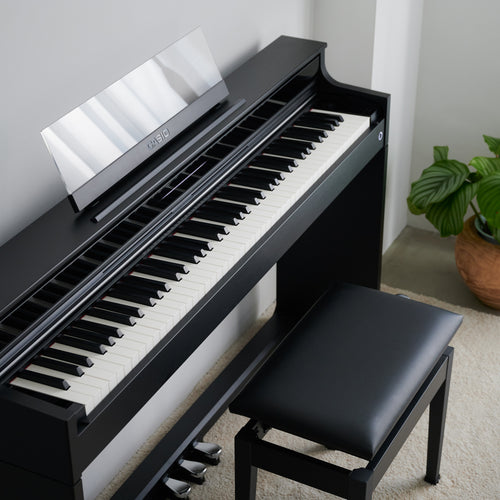 Casio Celviano AP-S450 Digital Piano - Black - in a stylish living room from above