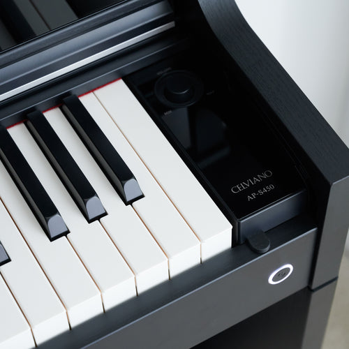 Casio Celviano AP-S450 Digital Piano - Black - power button and volume control