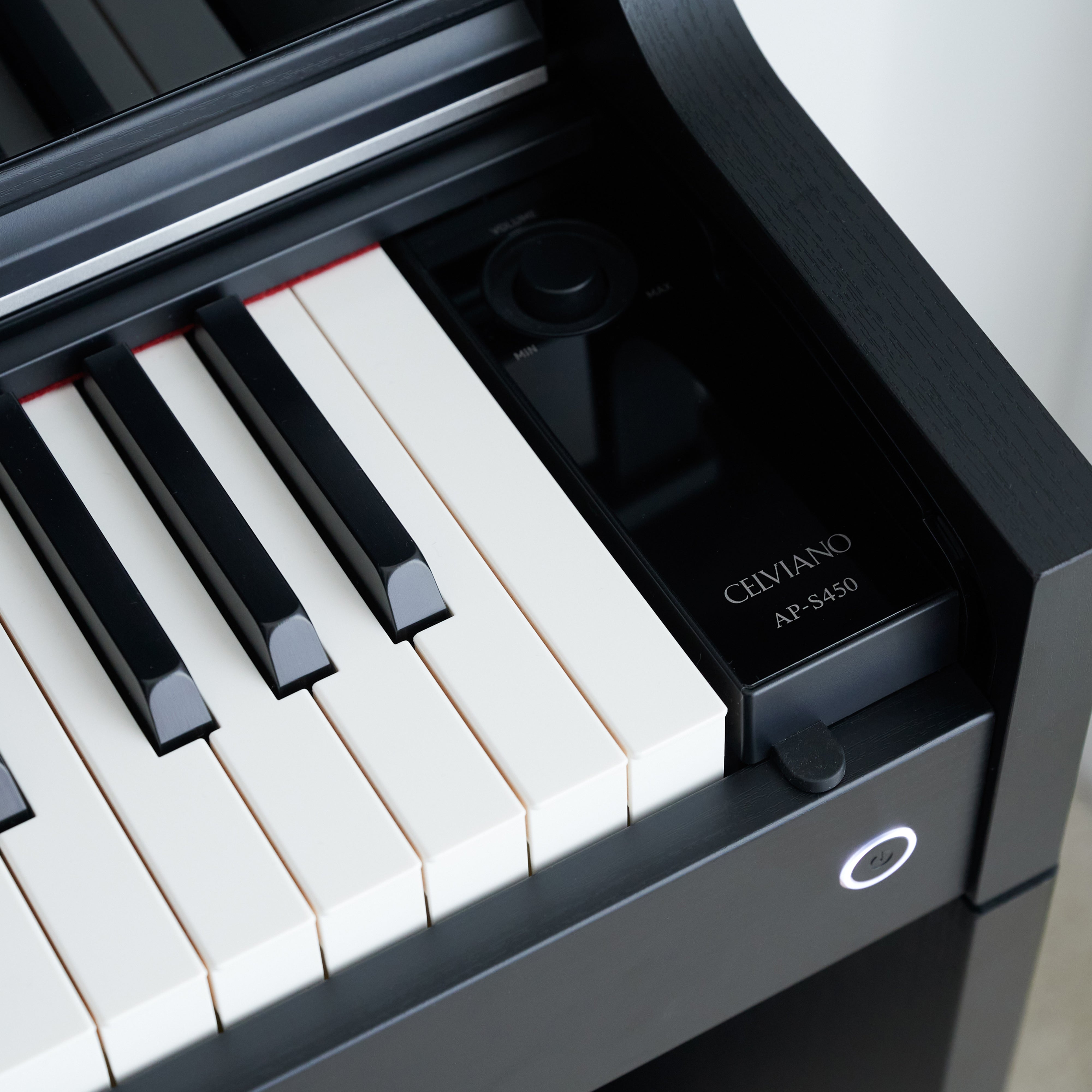 Casio Celviano AP-S450 Digital Piano - Black - power button and volume control
