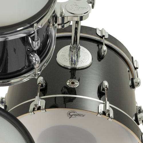 Close-up of Gretsch Catalina EVO Black Sparkle bass drum with chrome tom mount base
