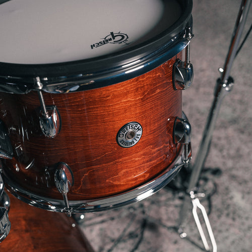 Overhead close-up of Gretsch Catalina EVO Walnut Glaze rack tom with mesh head
