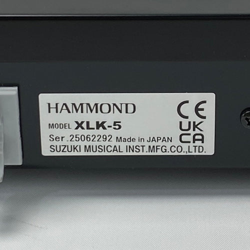 Hammond XLK-5 label on a musical instrument, showing certification logos and model details.