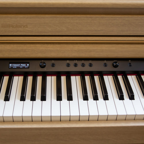 Roland HP704 Digital Piano - Light Oak controls to the right of center screen
