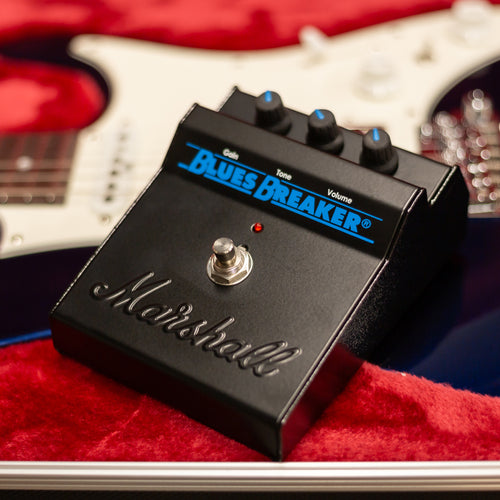 Marshall Bluesbreaker Reissue Pedal resting on a guitar in a case
