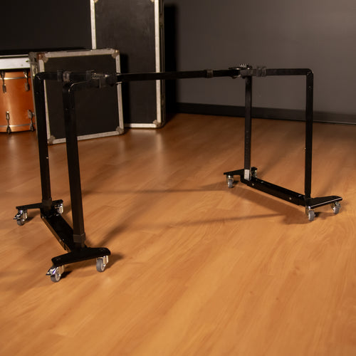Black keyboard stand on the K&M 18806 Trolley for Keyboard Stands