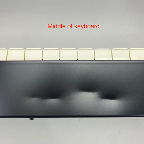 dents on the front panel of the instrument