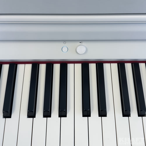 Roland HP704 Digital Piano - Satin White - power and volume controls