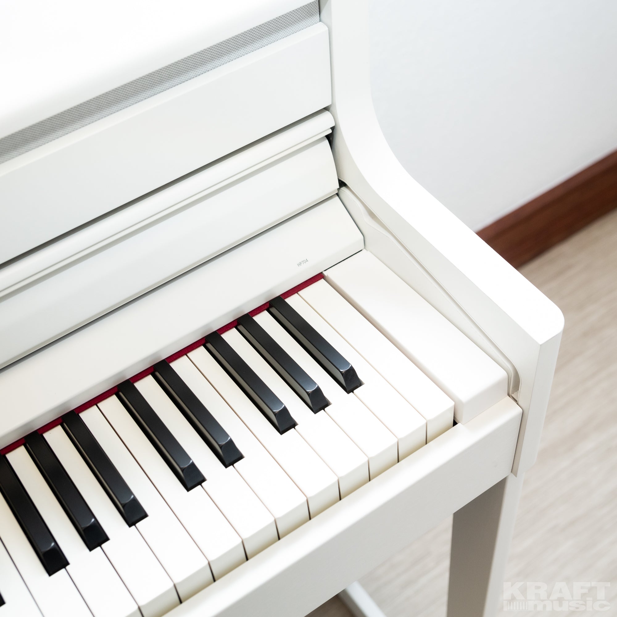Roland HP704 Digital Piano - Satin White - style shot
