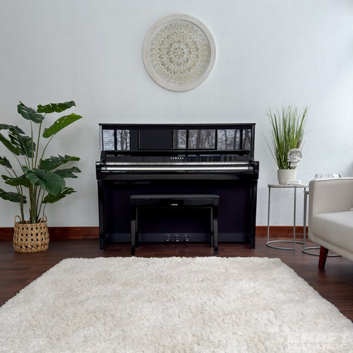 Yamaha Clavinova CSP-295 Digital Piano - Polished Ebony - in a stylish living room front facing