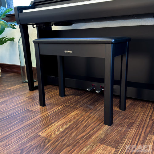Yamaha Clavinova CSP-255 Digital Piano in a stylish living room - bench