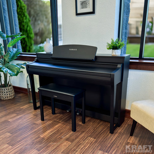 Yamaha Clavinova CSP-255 Digital Piano in a stylish living room - key cover closed