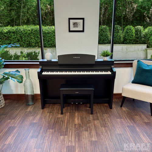 Yamaha Clavinova CSP-255 Digital Piano in a stylish living room - front view