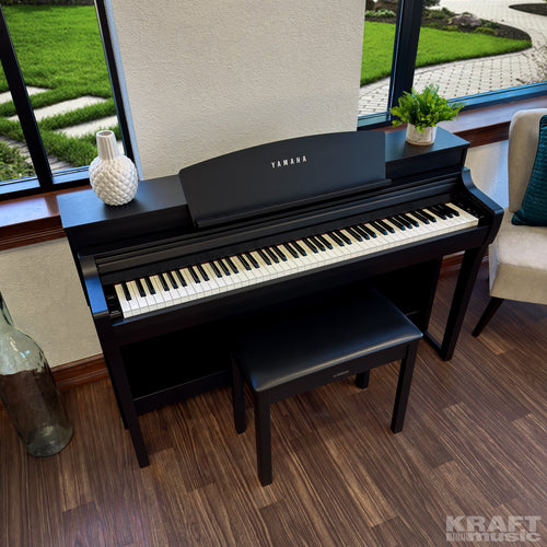 Yamaha Clavinova CSP-255 Digital Piano in a stylish living room - top view