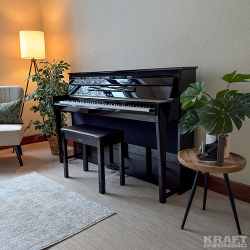 Yamaha AvantGrand NU1XA Hybrid Piano - Polished Ebony - left facing in a stylish living space