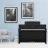 Yamaha Clavinova CLP-875 Digital Pianos - Matte Black in a stylish living room