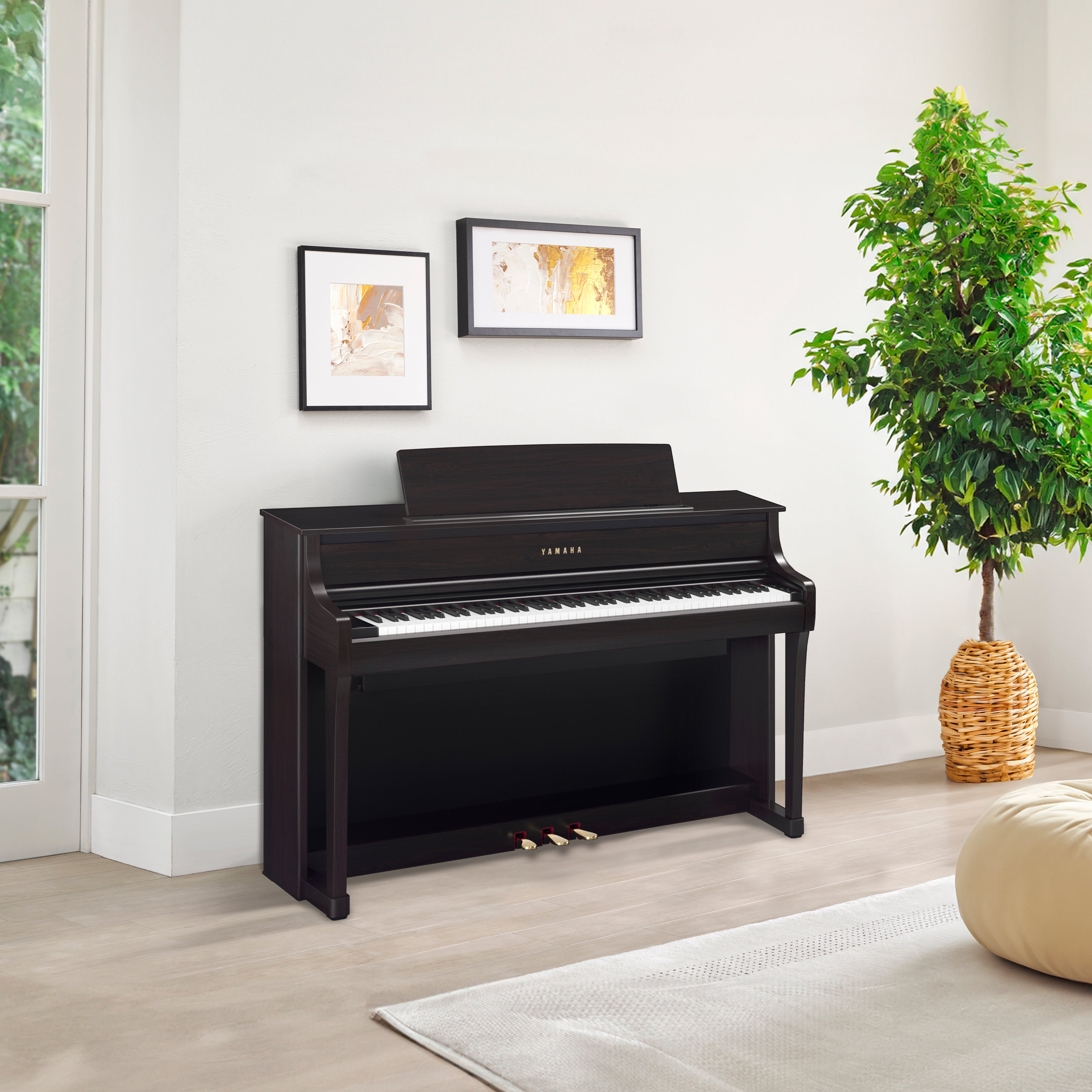 Yamaha Clavinova CLP-875 Digital Pianos - Rosewood in a stylish room