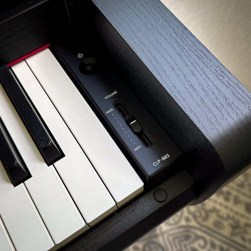 Yamaha Clavinova CLP-885 Digital Piano - Matte Black. volume and power controls