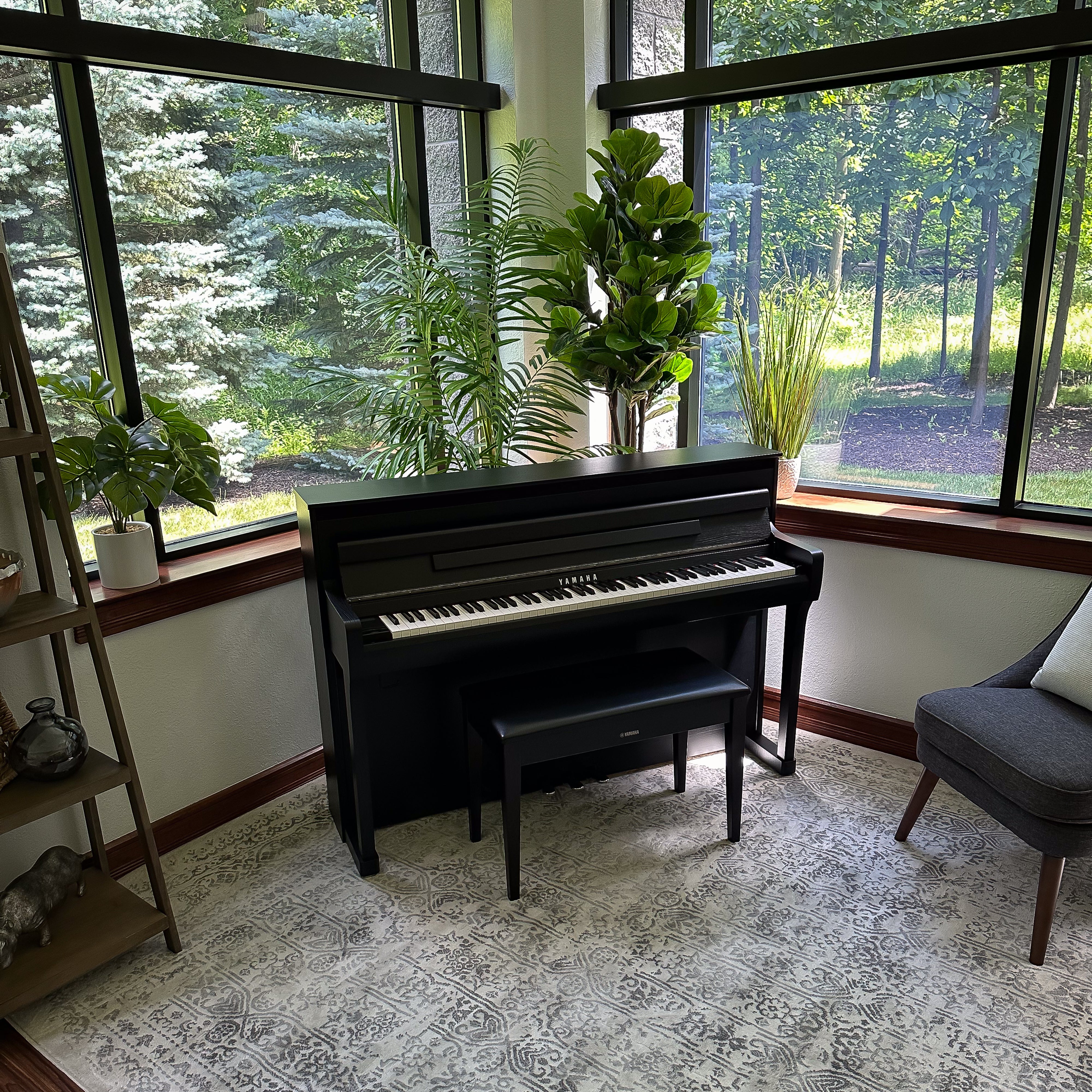 Yamaha Clavinova CLP-885 Digital Piano - Matte Black in a stylish room, view 7