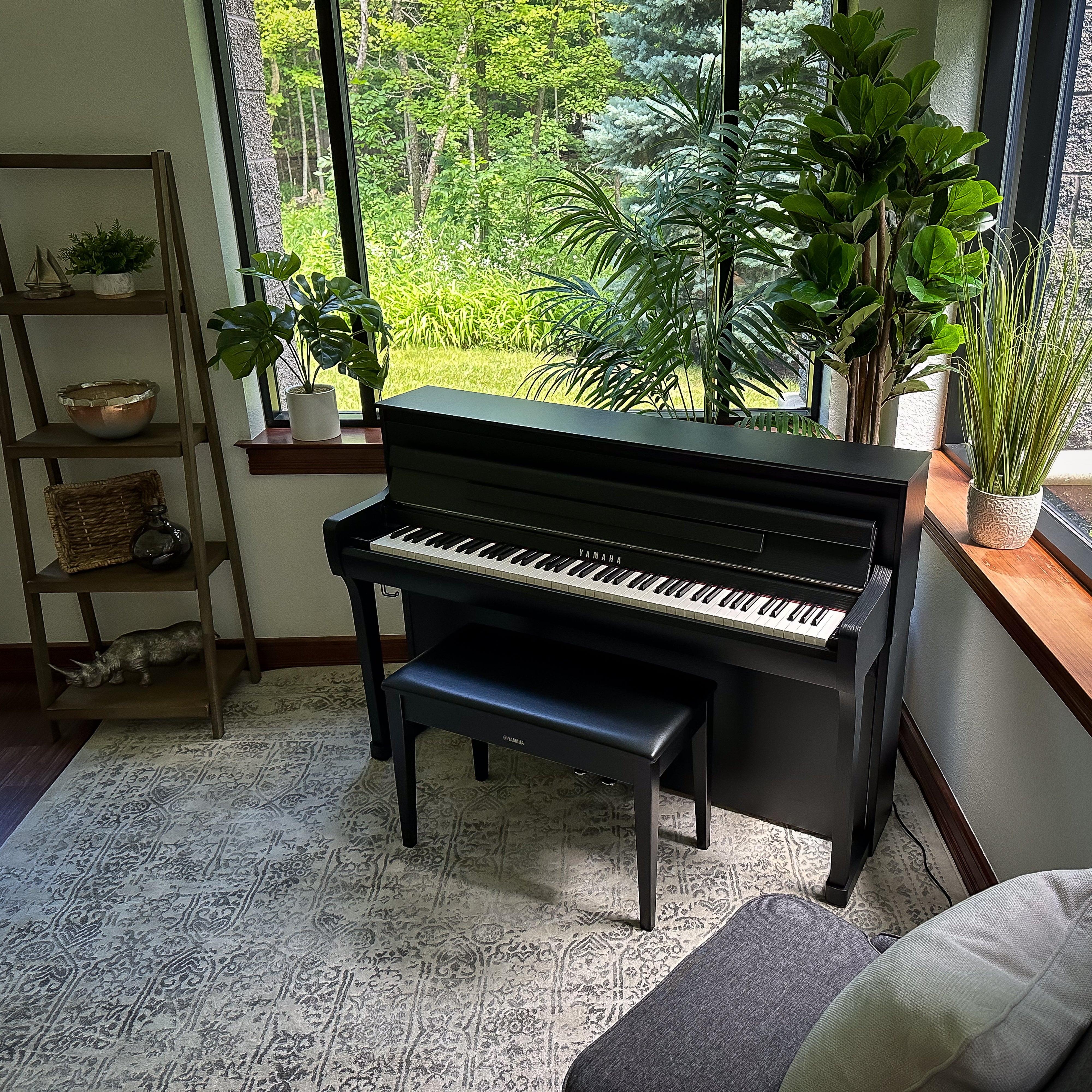 Yamaha Clavinova CLP-885 Digital Piano - Matte Black in a stylish room, view 5