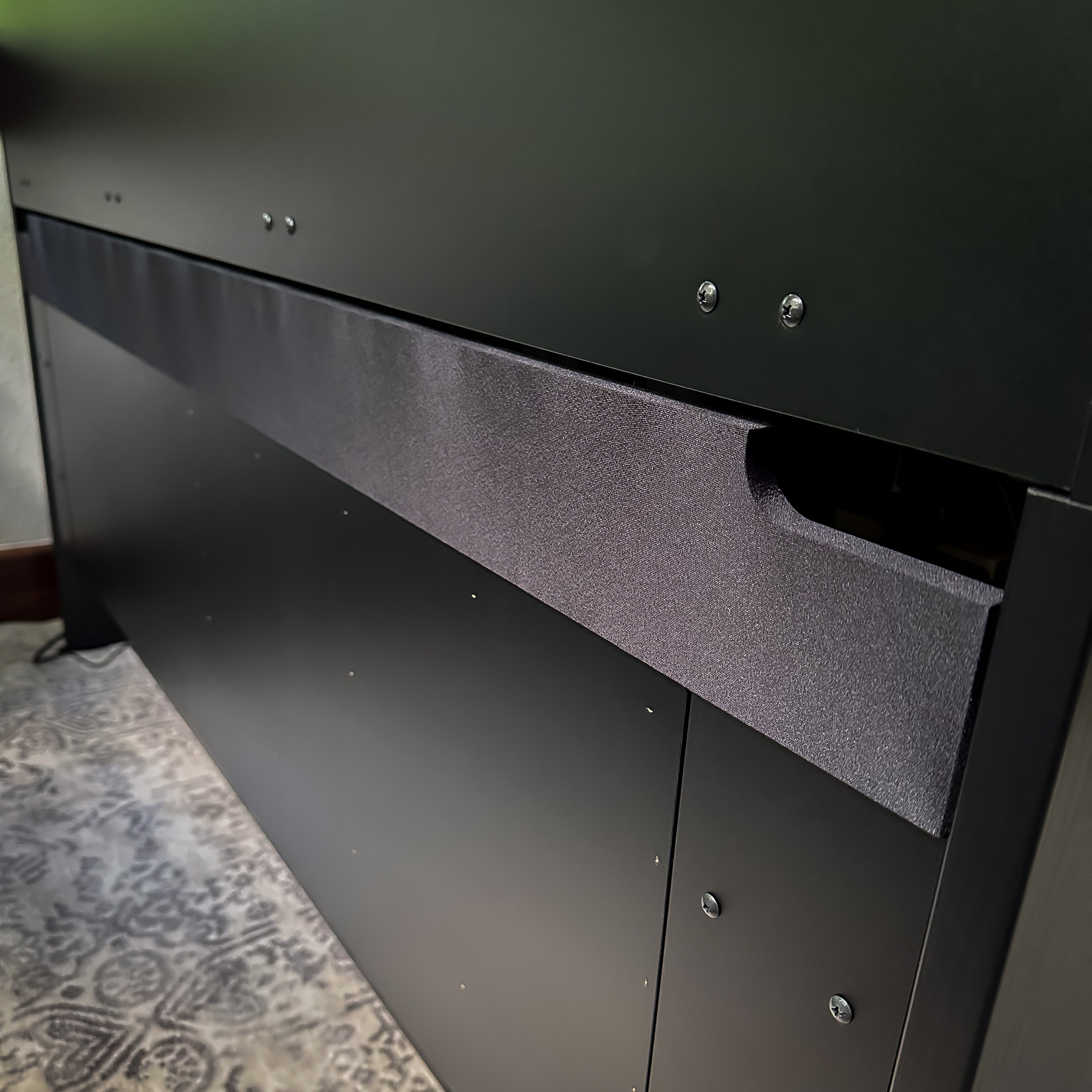 Yamaha Clavinova CLP-885 Digital Piano - Matte Black, lower speaker cover from the back