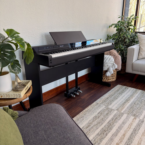 Yamaha P-S500B Digital Piano with L-300B Stand and LP-1B Triple Pedal - Black - in a stylish living space view from the left