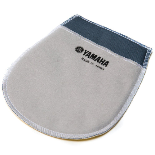 Grey and navy blue Yamaha piano polishing mitt with overlocked edges and a printed Yamaha logo with "Made in Japan" text, on a white background.