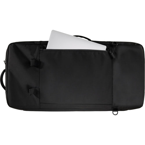 Bottom view of Moog Matriarch SR Case with ghosted image of laptop computer protruding from open zippered pocked for reference