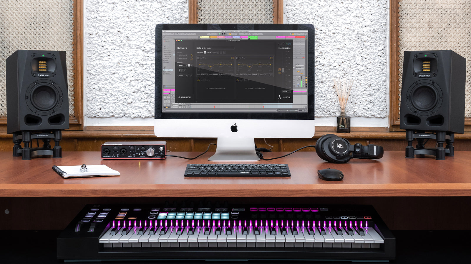 ADAM Audio A Series monitors on a desk in a studio