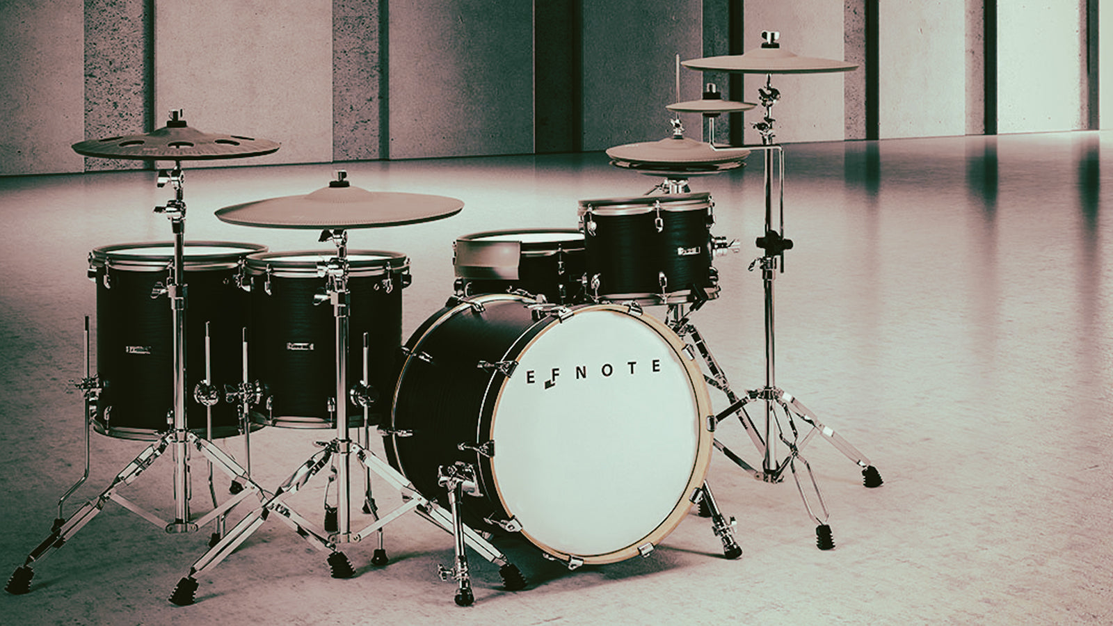 An Efnote 7x drum set in a large warehouse space