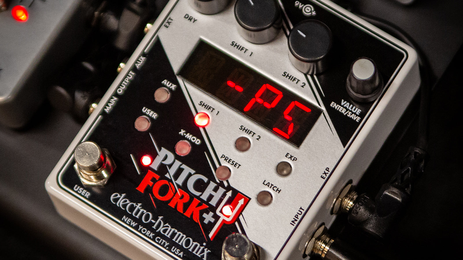 An Electro-Hamonix Pitch Fork+ pedal on a pedalboard