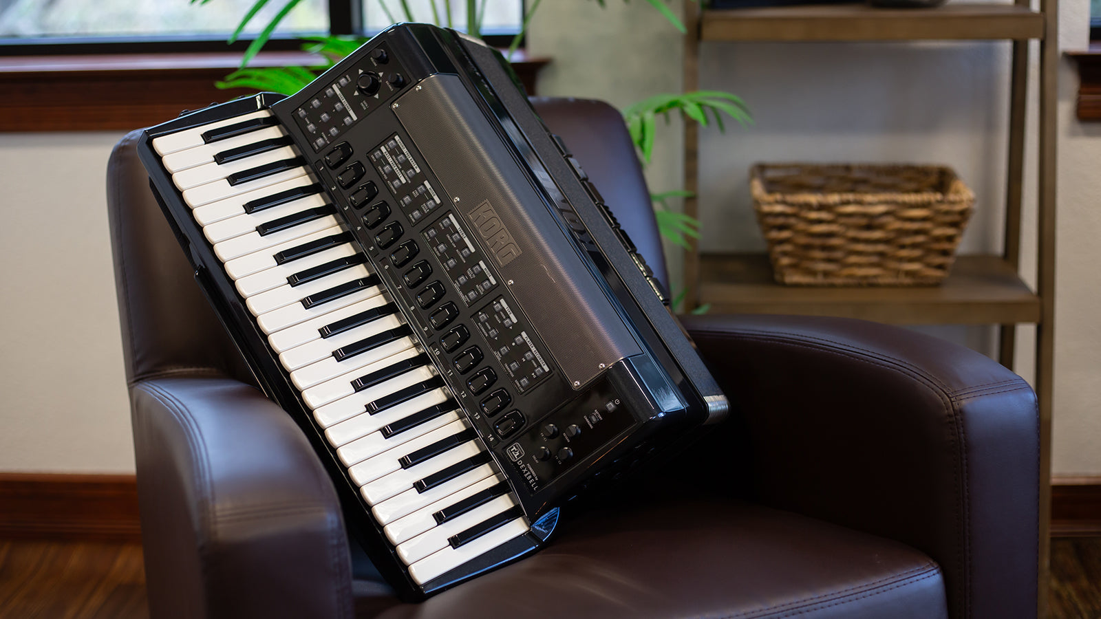 A Korg Fisa Suprema on a chair in a stylish room