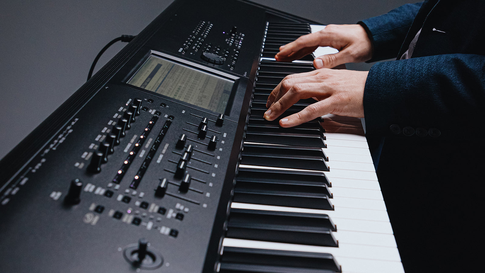Side view of Kronos 3 panel and keys with player's hands