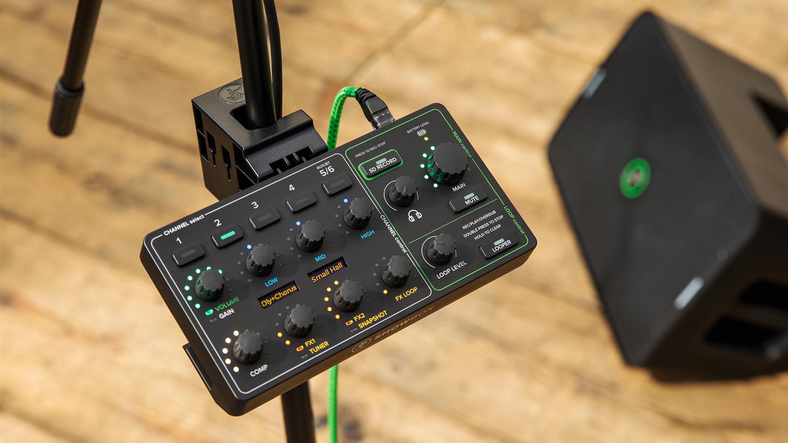 ShowBox mixer unit on stand with speaker on floor