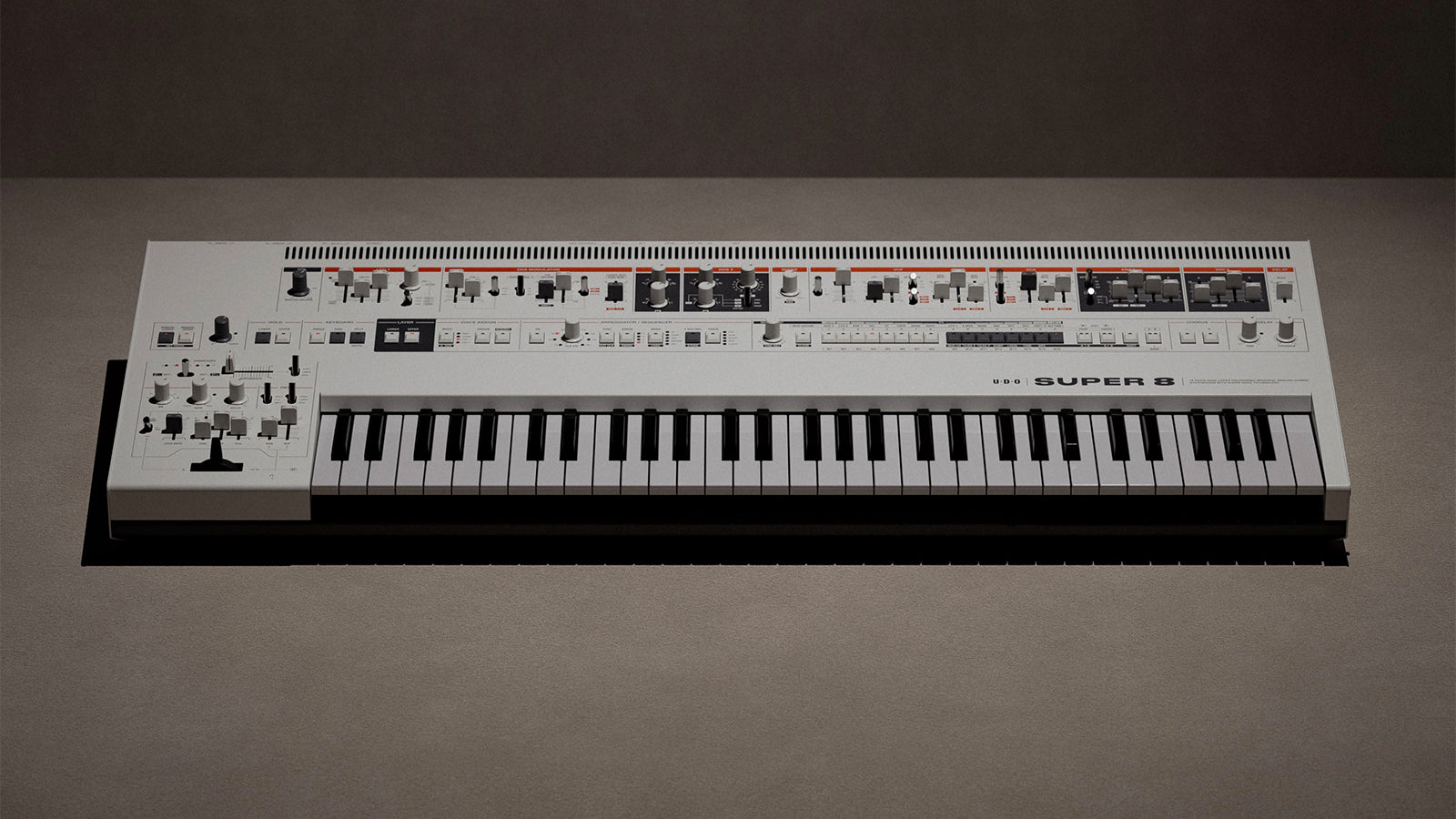 An UDO Audio Super 8 - White on a dim lit surface