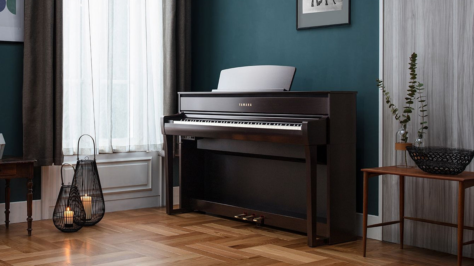 A Yamaha upright piano in a stylish room