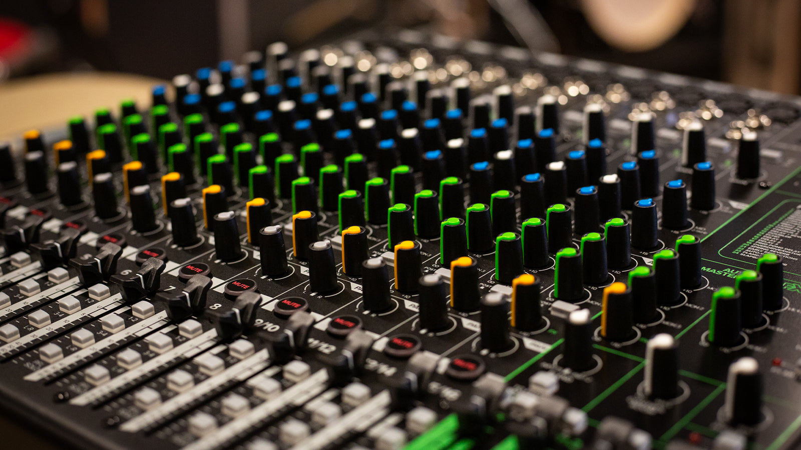 A Mackie mixer in a studio setting