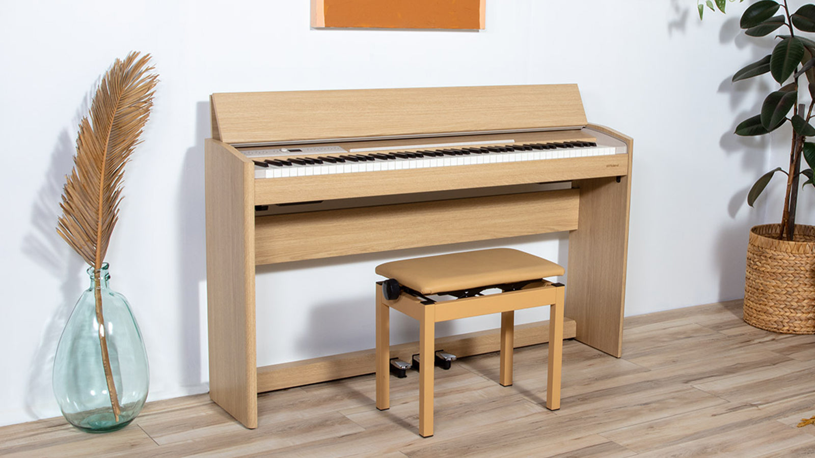 A Roland F701 in a light oak finish in a stylish living space