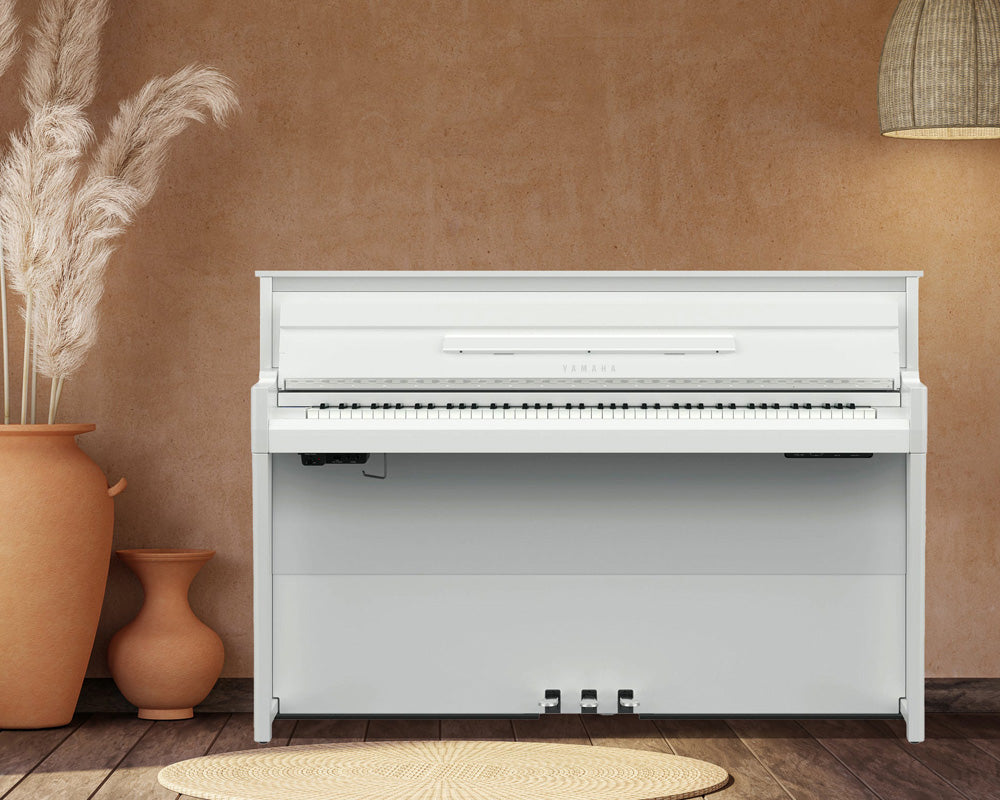 White Yamaha NU1XA in a stylish room