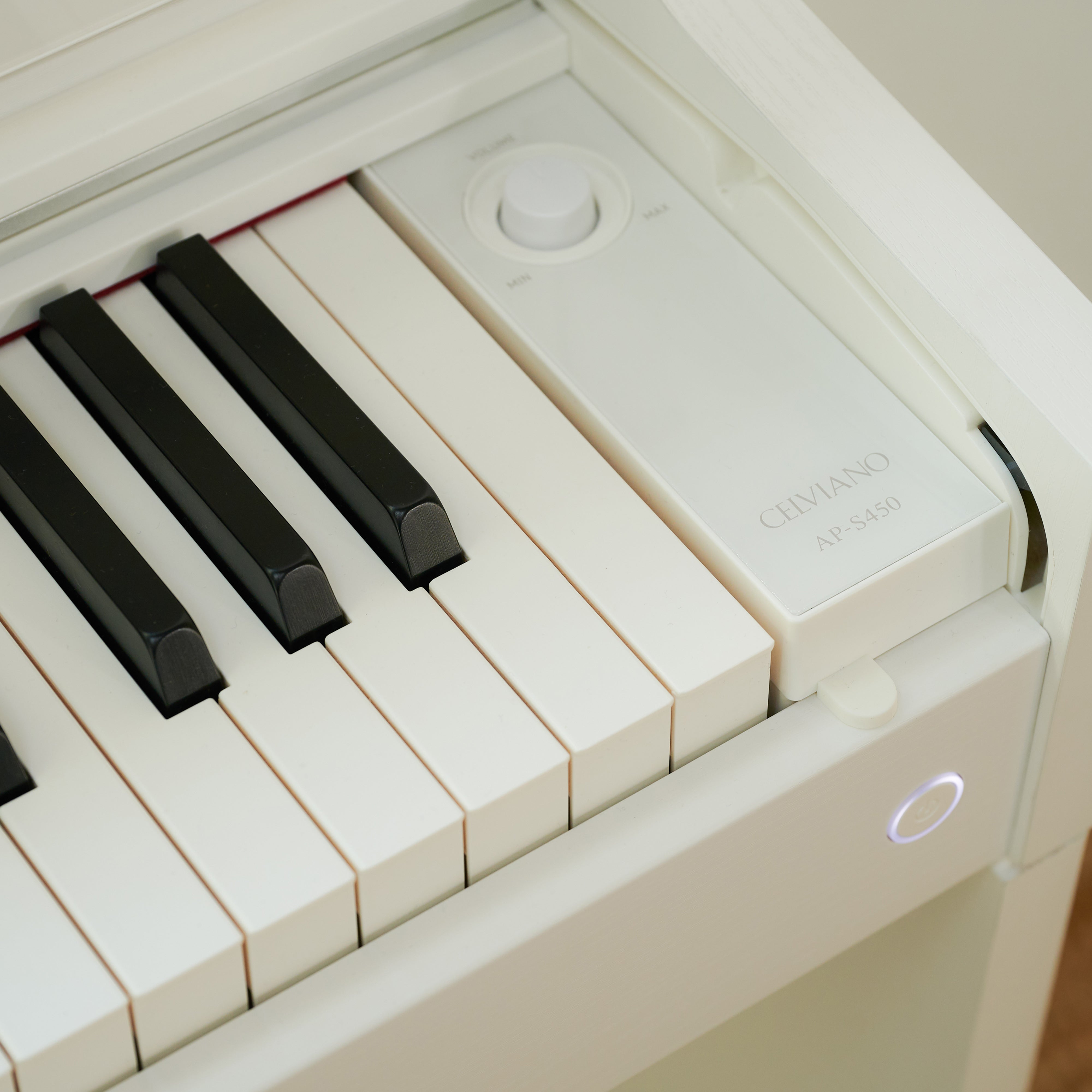 Casio Celviano AP-S450 Digital Piano - White - power and volume controls