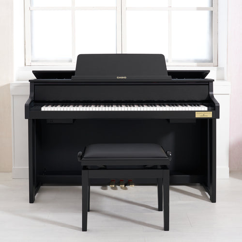 Casio Celviano Grand Hybrid GP-310 Digital Piano - Satin Black - Front view in a living room