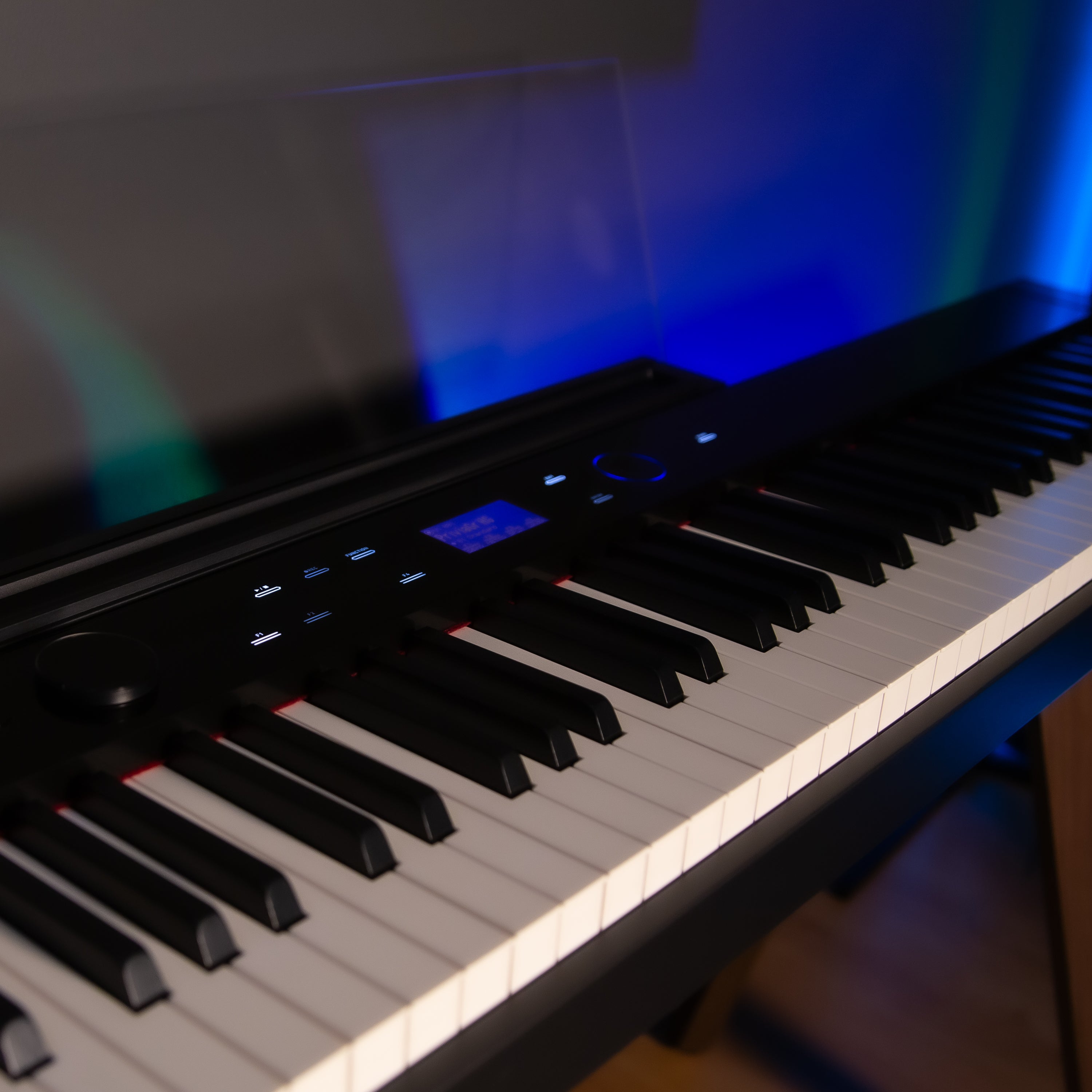 Casio PX-S7000 Digital Piano - Black - left angle view, cropped in a home studio