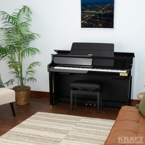 Casio Celviano Grand Hybrid GP-510 Digital Piano - Black Polish - Left angle in a stylish living room