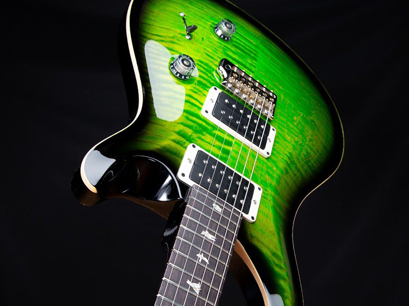 Image of green and black PRS electric guitar