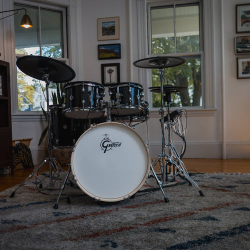 Gretsch Catalina EVO Black Sparkle electronic drum kit set up in a living room, front view